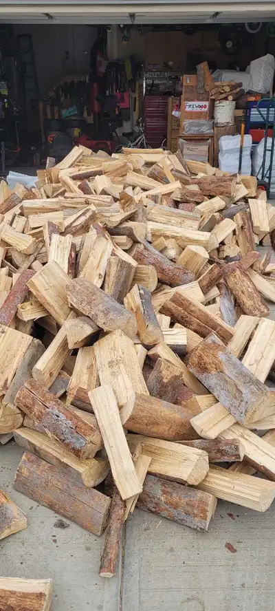 Selling premium tamarack firewood Dry, already split, seasoned/dead standing 120 to 130 pound jumbo...