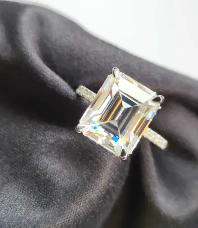 ★ Stone Details: ➙ Stone Type: Moissanite ➙ Carat Weight: 5 Ct CT ➙ Shape: Emerald ➙ Color: D ➙ Clar...