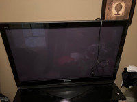 Panasonic tv and glass stand