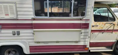 This is "Freckles"—a 1976 Travelaire built on a heavy-duty Ford 1-ton chassis with the legendary 460...