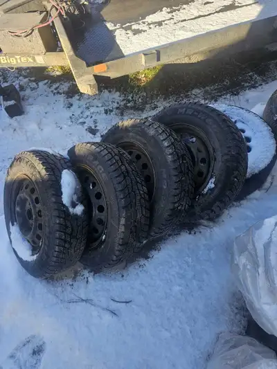 I am selling a set of winter tires and rims that fit a 2006 Hyundai Accent. These tires are in like...