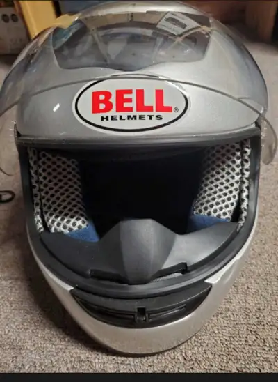 Bell motorcycle helmut. Used once for car drag race. Older but excellent condition. Make me an reaso...