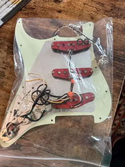 SRV type pickups. Superlative performance characteristics. They out-perform equivalent Fender pickup...