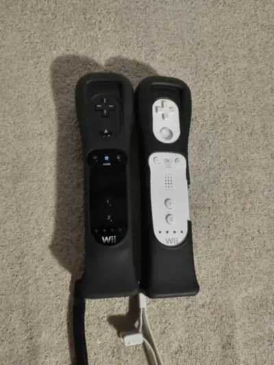 Two Nintendo Wii controller's with Wii motion attachment for sale $35 each
