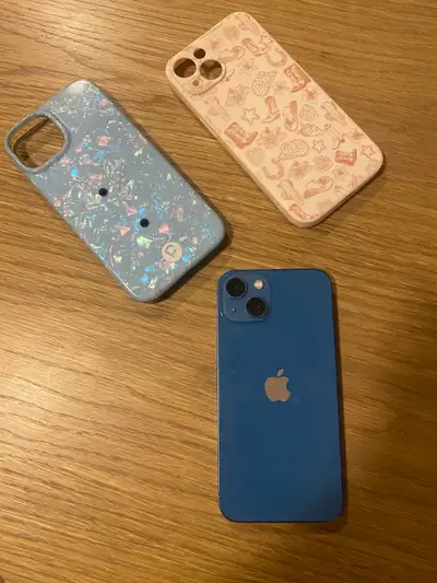 Very gently used blue iPhone 13 with 128GB of storage. Purchased used as a new phone for myself but...