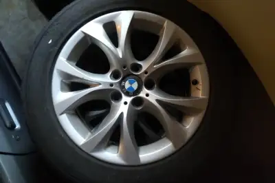 235/55/17 Bolt pattern 5 x120 Tires in real good shape not that old and not many kms on them
