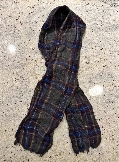 Patterned 100% Wool Scarf accidently put in dryer and shrunk a bit so price reflects this condition....