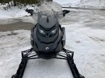 Like new. Only 179 kms. Includes studded track, mirrors, ice scratchers and heated visor outlet. Adj...
