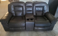 Grey leather rocker recliner loveseat