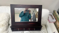 Mirror with hangers and shelf 