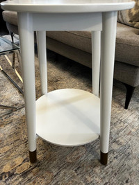 Elegant Pair of White Wooden Side Tables with Gold leg Trims.