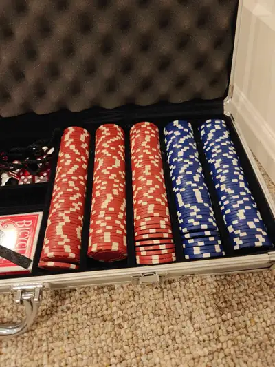 This poker set is in used condition, but still ready for a fun night of games! It includes a variety...