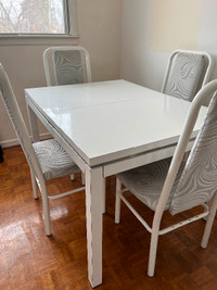 White kitchen table with 4 chairs