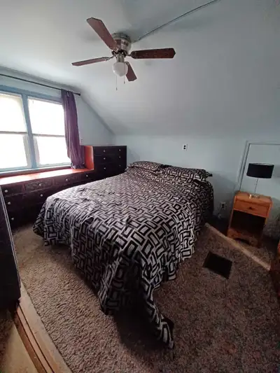 Private furnished bedroom available in a quiet, well-maintained home in West End Belleville on a pea...
