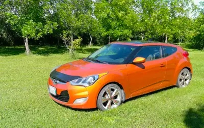 2012 Hyundai Veloster with a 1.6L engine & a 6-speed manual transmission, this car has a safety & ha...