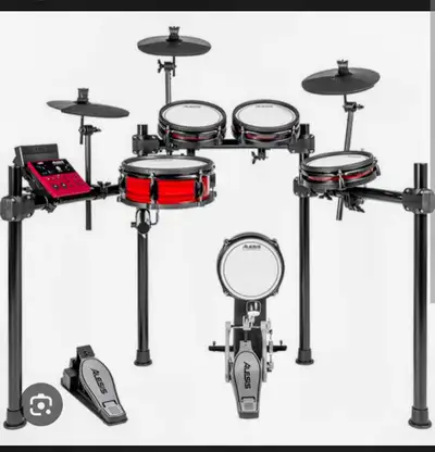 Selling a brand new, never used Alesis Nitro Pro Electronic Drum Set. Still factory sealed in the or...
