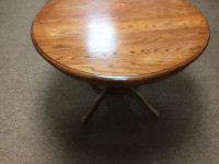 Solid wood round dining table. No leaves. $70