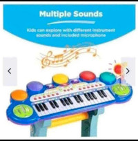 BNIB 37 key kids electric keyboard with microphone and stool 