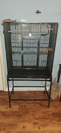 Almost new bird cage, 18" Deep, 30" wide, 61/12"  