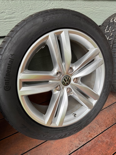 Brand new condition (summer used only) 4 - 20" Pikes Peak wheels with 2025 Continental Extreme Conta...
