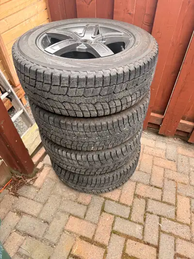 Toyo Winter tires on Mazzi rims size 235/65R18 106H. Tires have barely any milage on them was on a 2...