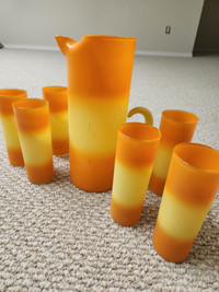 Vintage orange frosted pitcher and six glasses $80.00
