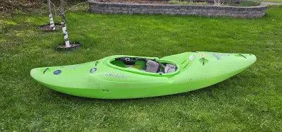 This is a whitewater (for paddling rapids). It is used but good condition with just normal river ras...