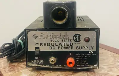 Reliable Audiodek DVP-312 solid state regulated DC power supply. Unit has input 117V AC 60Hz 100W. O...