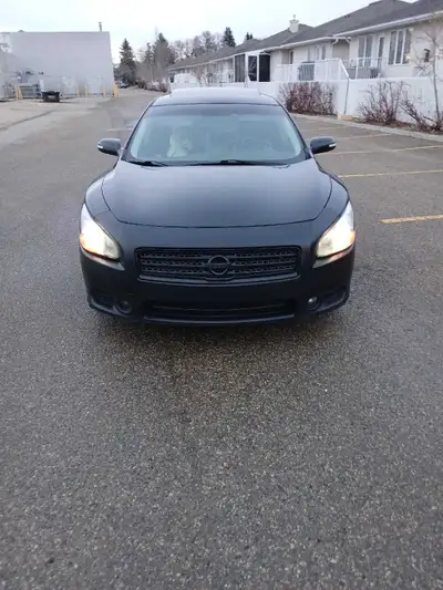 I am selling a maxima SL wide body cvt trans with a 3.5 ltr 300hp very fast very reliable it comes w...