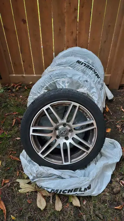 5x108mm // 5x4.25" snow tires on alloy wheels. Came off a bmw. 60-75% tread life left. $675 Tire siz...