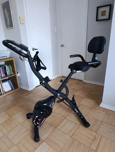 Kalwol foldable stationary bike, 16-level magnetic resistance, View more