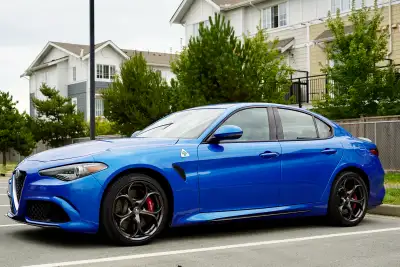 Do your research before wasting your and my time, please. 2018 Alfa Romeo Giulia Quadrifoglio with 7...