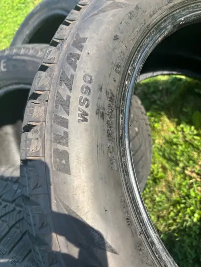 These Bridgestone Blizzak WS90 winter tires, size 225/55R17, are in excellent pre-owned condition (d...