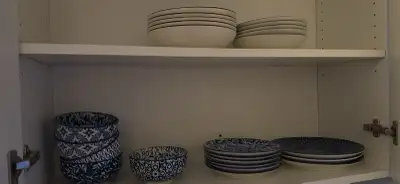 This blue and white dish set includes service for eight, plus coordinating pasta bowls, perfect for...