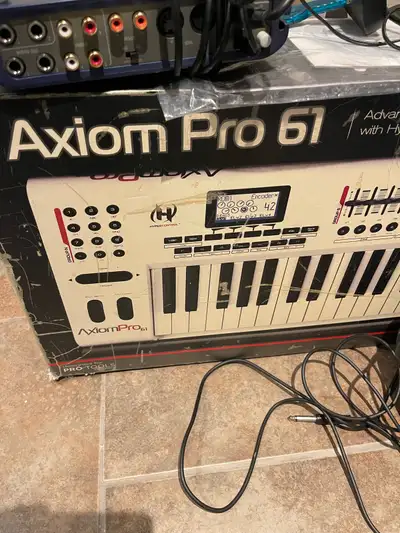 Axiom Pro 61 MIDI controller along with the M-Audio Fast Track Pro audio interface plus Behringer Tr...