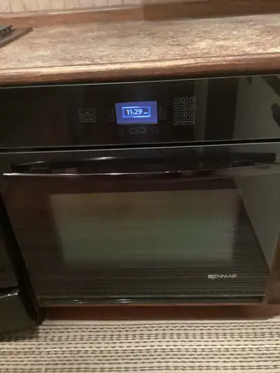 This is a used Jenn-Air 30" Black Electric Built-In Oven, model number JJW2430WB. It is clean and in...