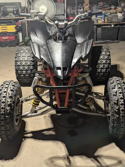Yamaha YFZ 450SE has a FMF silencer FMF powerbomb header. K&n air filter it's jetted runs great very...