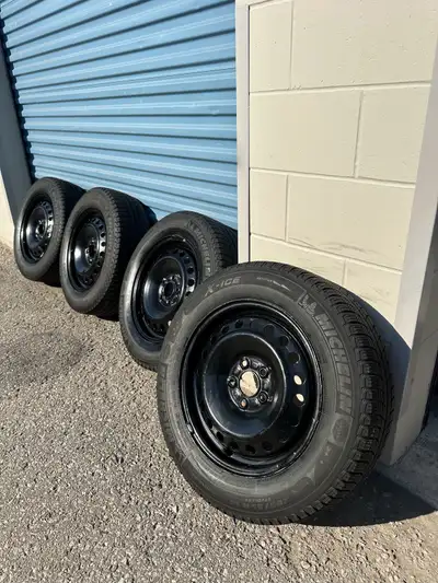 Set of four 205/65r16 Michelin x-ice xi3 winter tires on OEM Ford 5x108 rims. This set was originall...