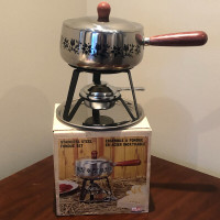 Fondue Set Stainless Steel. Never used.  Metal stand and tray.