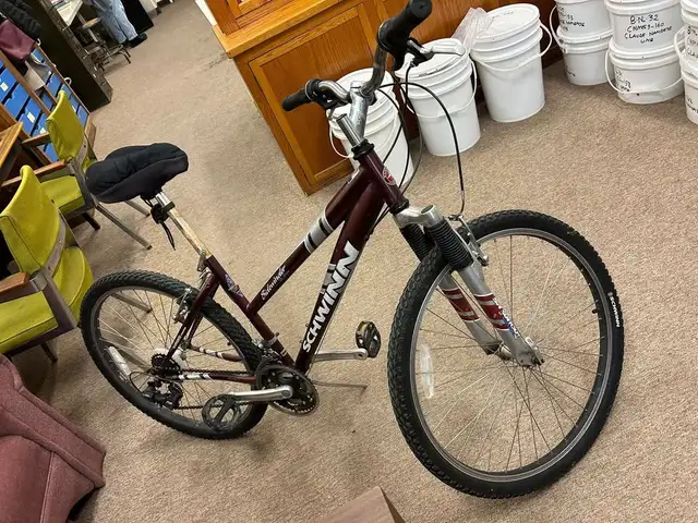Bicycle with Helmet in Road in Fredericton - Image 3