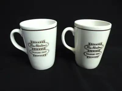 I am selling this Vintage Pair of Tim Horton's Syracuse China Coffee Mugs. They are size small mugs...