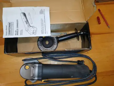 Crafatsman 7Amp 4 1/2 inch angle grinder corded in box and with Manual and parts. Used a few times