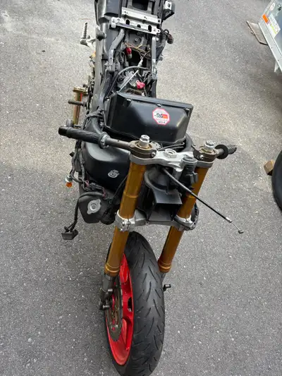 Stock bodywork and tank are gone. No ownership. Motor has a top end knock. Have a ton of parts not i...