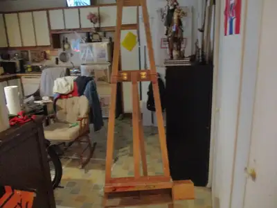 Easel is in very good condition. An artist's easel & 72" tall. It adjusts to 48" tall as well. Paint...