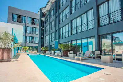 Our family is offering this beautiful and fully furnished apartment in the modern Rizz Suites comple...