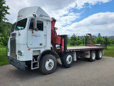1987 Freightliner Cabover, tandem-tandem, flat deck with Ferrari crane. 8V92 Silver, 475 hp. Just fr...