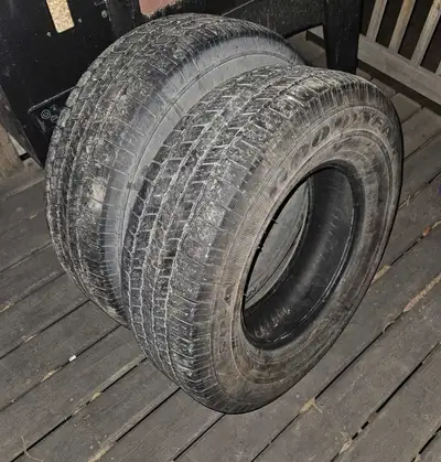 2 Size 265 70 R17 tires one has about half tread the other about a little more then a quarter on it....