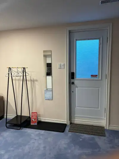 Very cosy furnished Bachelor Basement Walk-up separate entrance Separate sleeping area with wardrobe...