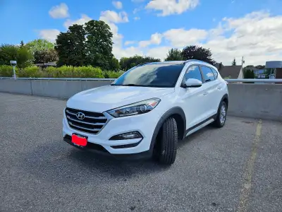 2017 hvundai Tucson GLS SE Luxury All season tires on alloy rims on car; 4 M+S tire on steel rims, a...
