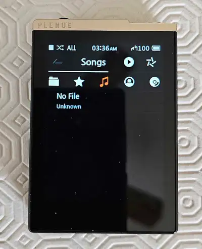 I am selling a COWON PLENUE D 32GB MP3 High Resolution Player Gold/Black. Comes with a leather case...